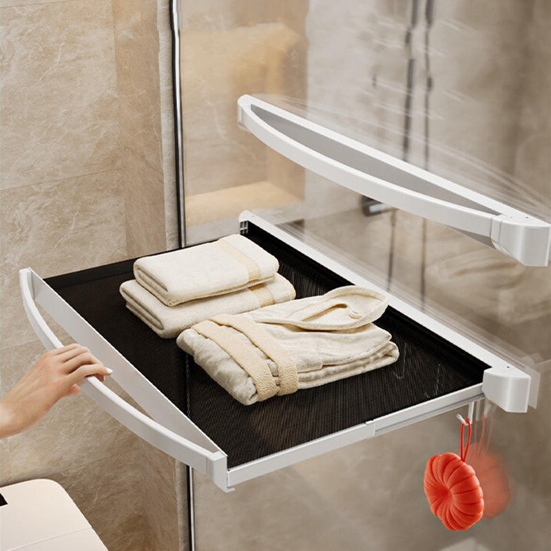 Aovoton Expandable Metal Bathroom Towel Rack in grey and white, wall-mounted with a modern foldable design, showing the adjustable 47cm to 63cm space-saving storage solution.
